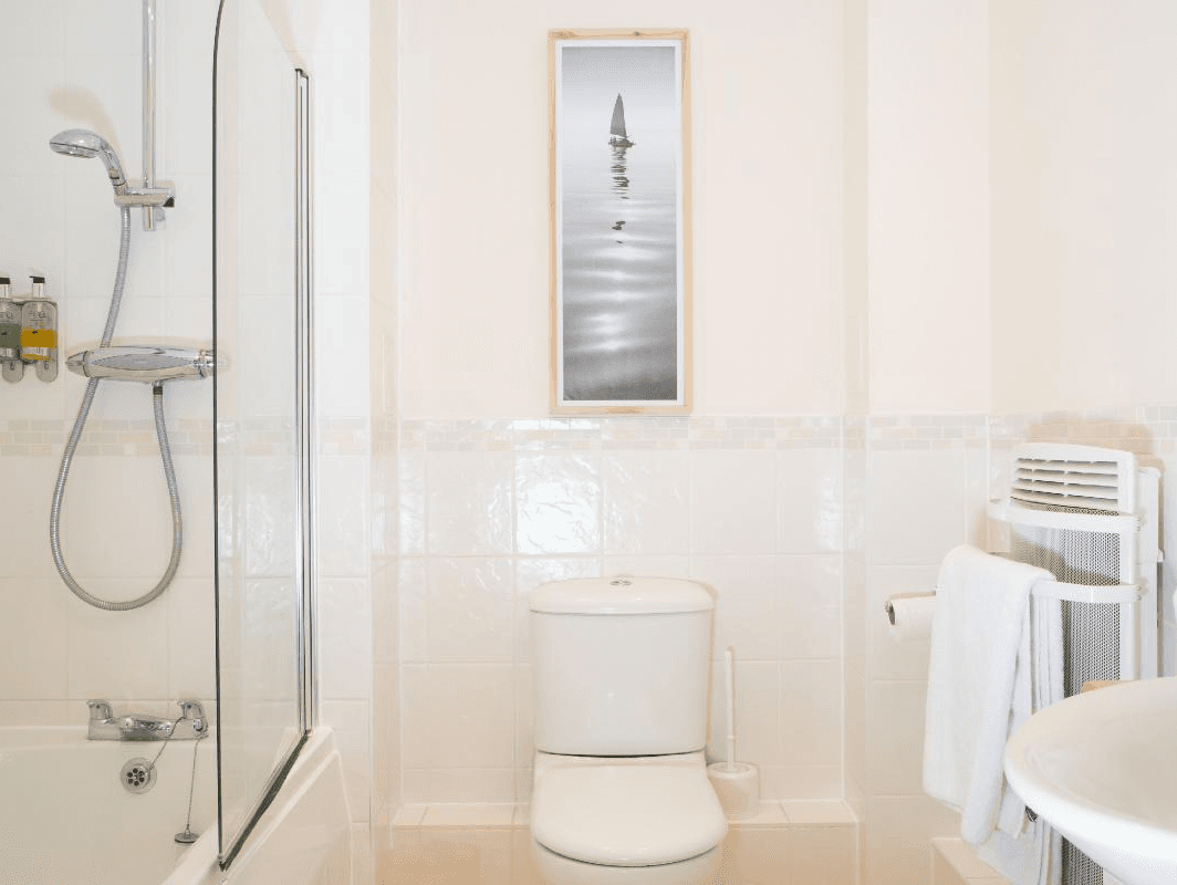 Bright bathroom with walk-in shower, toilet, and sink at The Elm Suite, Kings Road, Reading Bright bathroom with walk-in shower, toilet, and sink at The Elm Suite, Kings Road, Reading