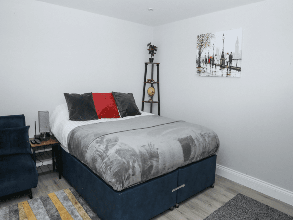 Modern kitchenette with integrated appliances, cabinets, and washing machine – Crofton Park, London Modern kitchenette with integrated appliances, cabinets, and washing machine – Crofton Park, London