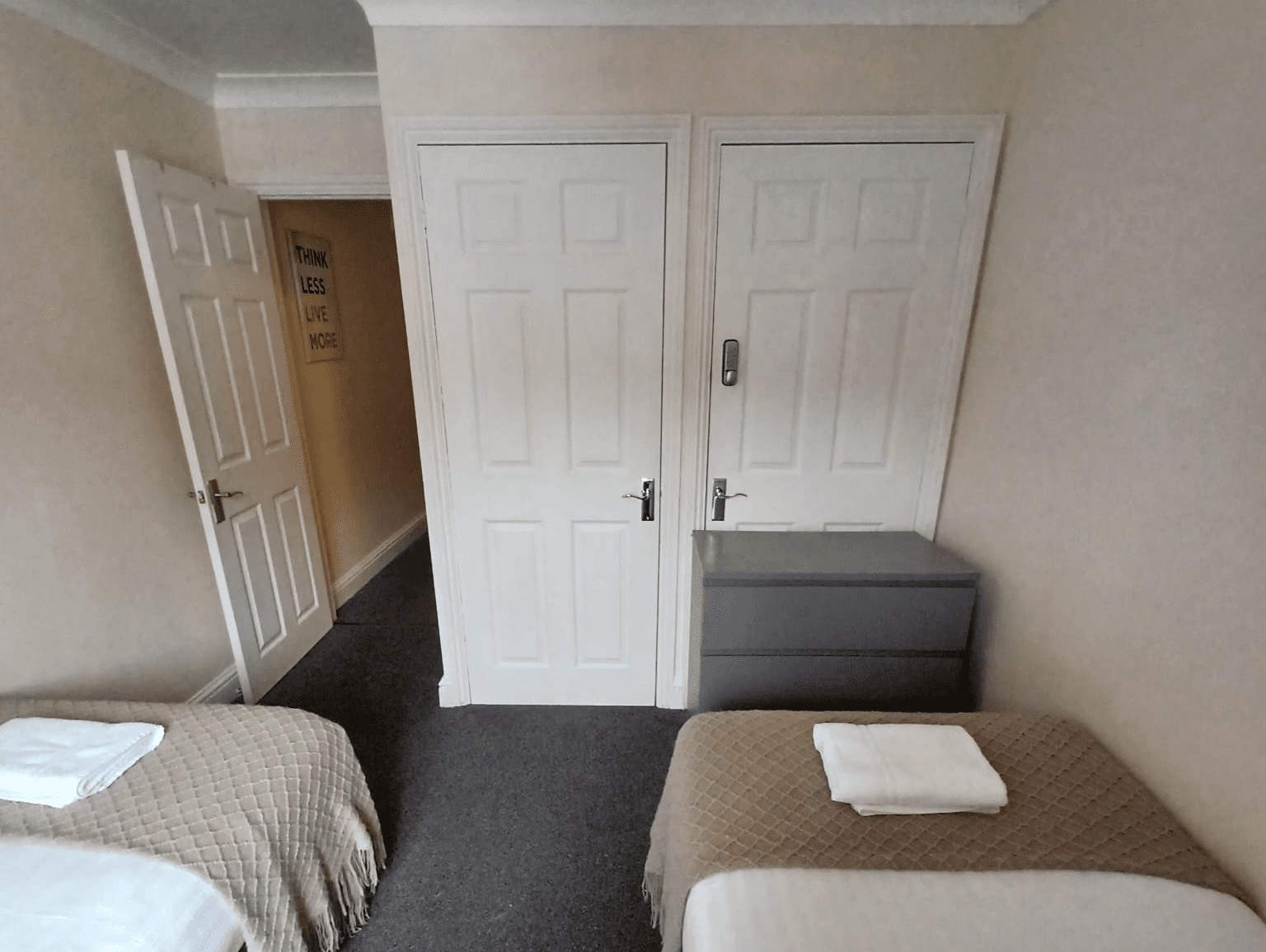 Apartment hall with bench, coat hooks, and double doors – Wilton H1 - Southampton Apartment hall with bench, coat hooks, and double doors – Wilton H1 - Southampton