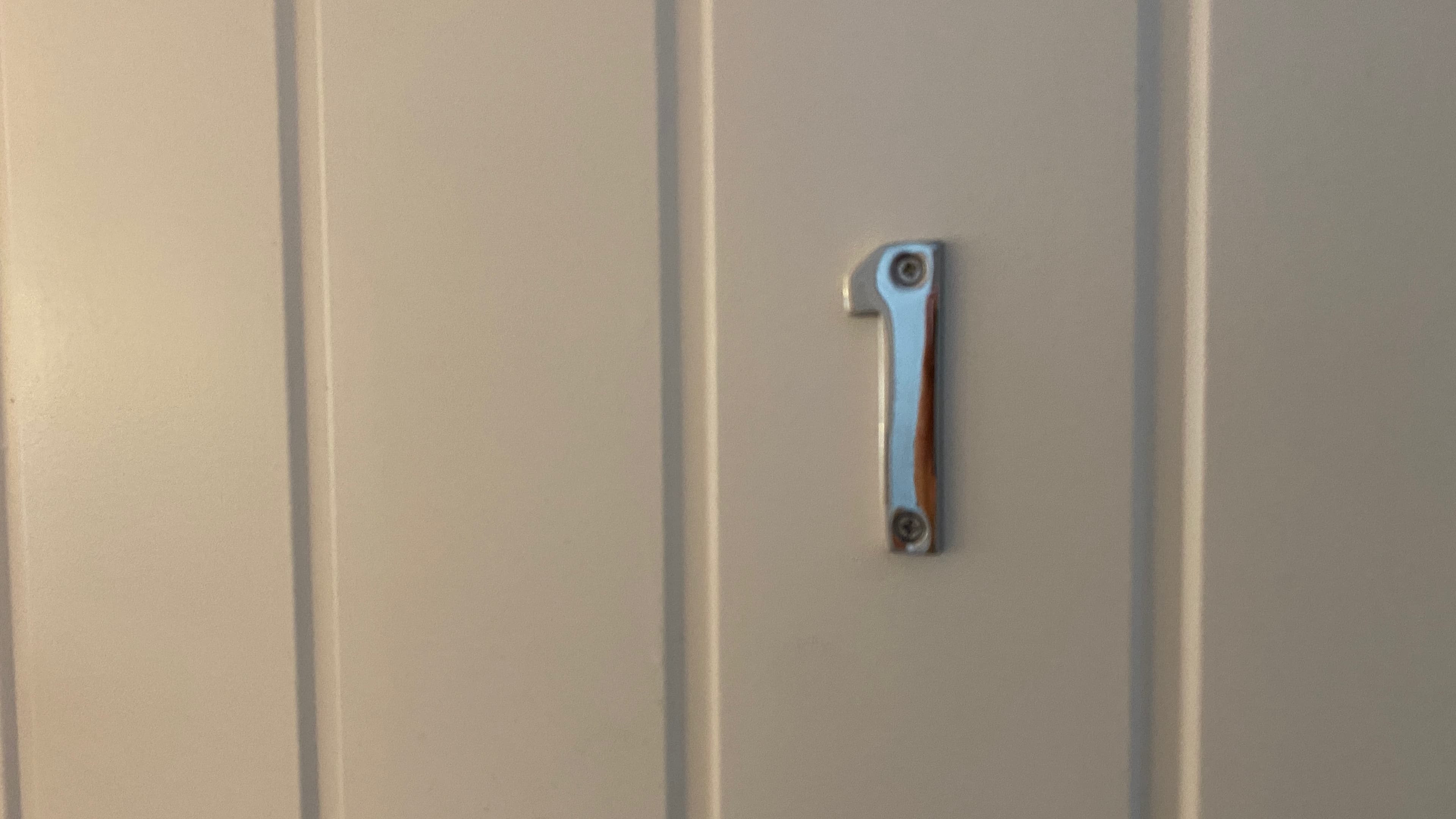 Hallway with wall-mounted coat hook in neutral-toned serviced apartment – De Parys Flat 1, Bedford Hallway with wall-mounted coat hook in neutral-toned serviced apartment – De Parys Flat 1, Bedford