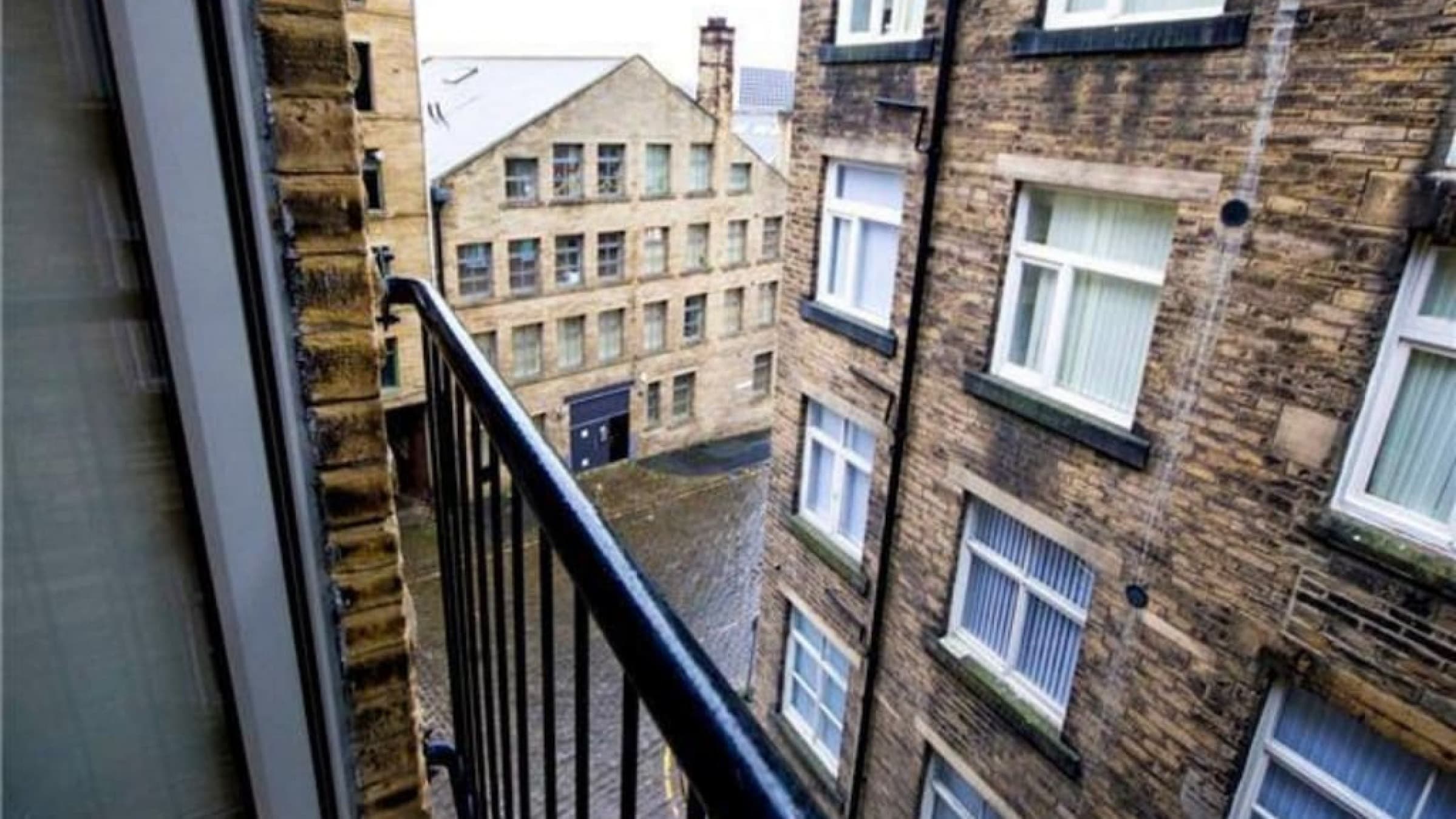 Balcony or outside window view of Bradford city rooftops and historic brick buildings – Grattan 1 - Bradford, Bradford Balcony or outside window view of Bradford city rooftops and historic brick buildings – Grattan 1 - Bradford, Bradford